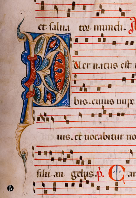 Pagina di manoscritto musicale con note su pentagramma e una lettera decorata in stile medievale.